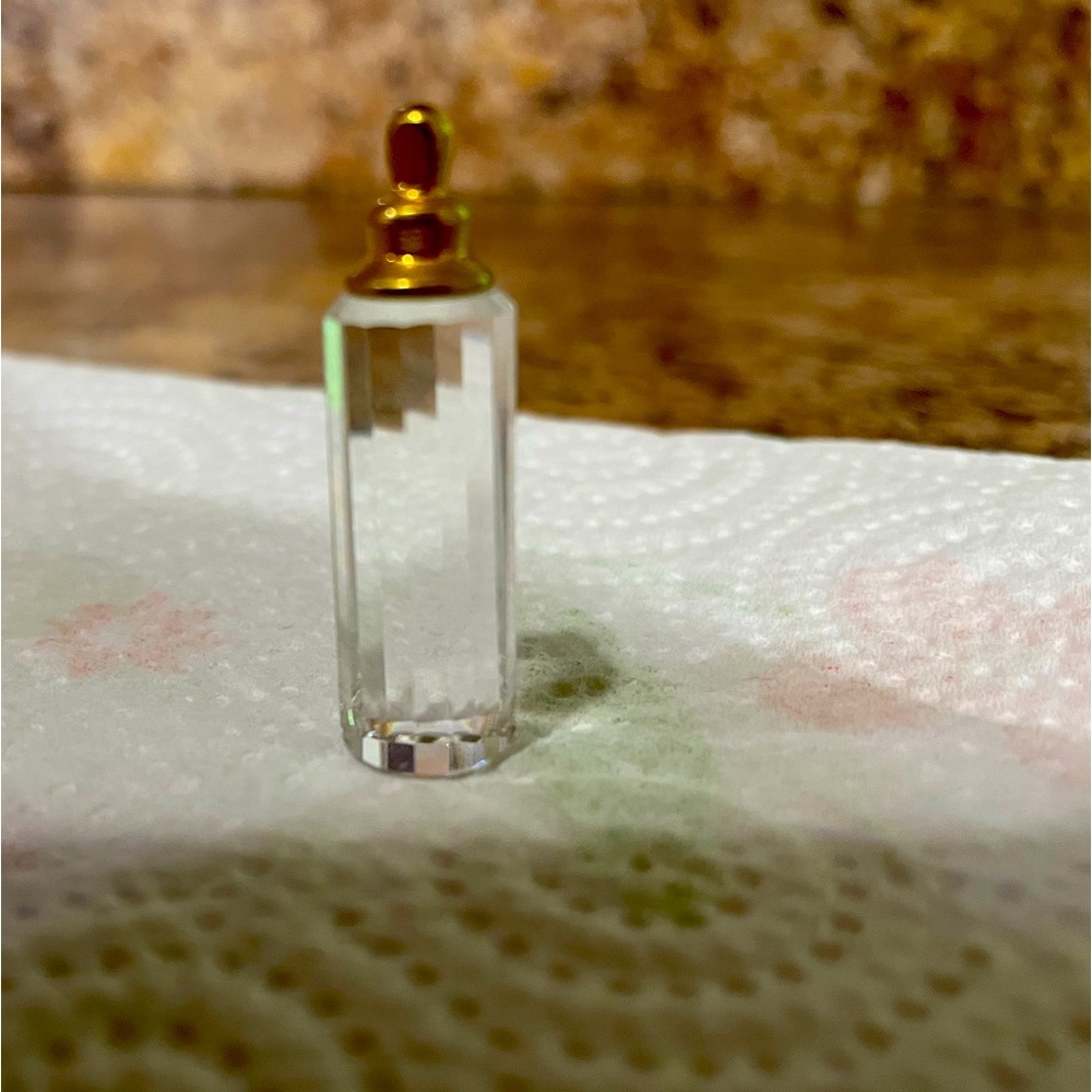Swarovski crystal baby bottle part of the childhood dreams group.